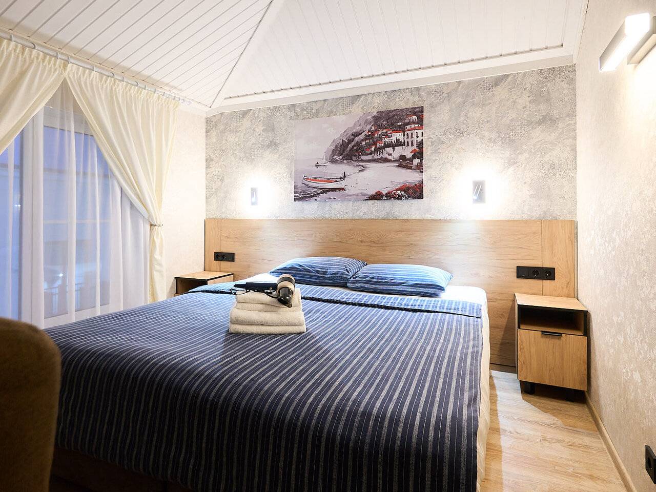 Двухместный номер КОМФОРТ с большой двуспальной кроватью или двумя односпальными кроватями